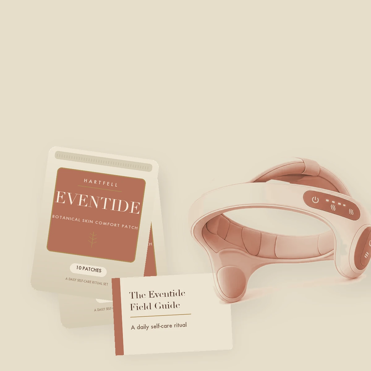 The Hartfell Eventide Set — a handheld scalp massager, a botanical skin comfort patch, a printed guide and a waxed-linen sleeve, arranged on natural linen